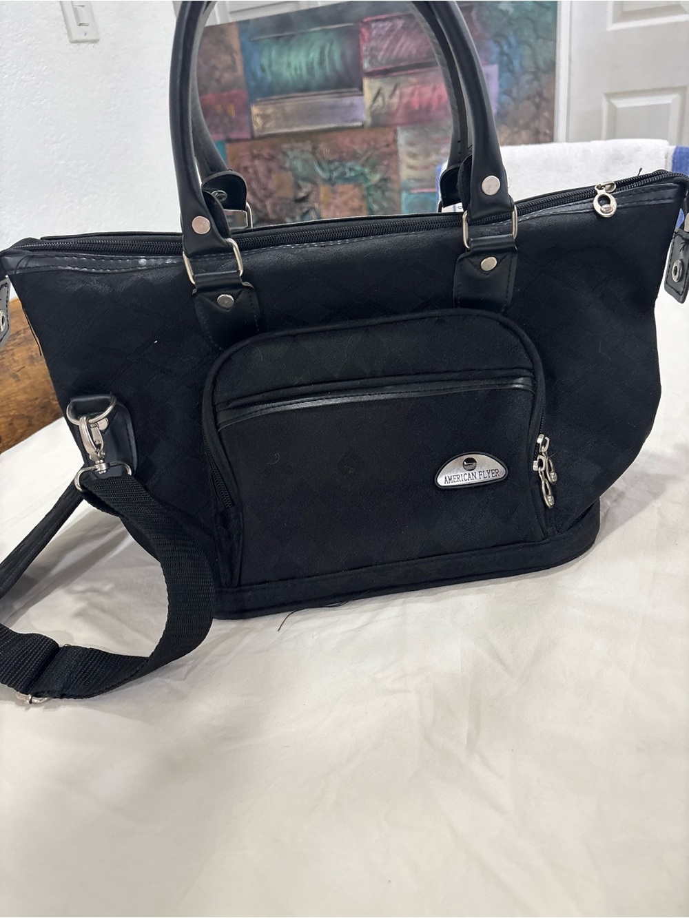 black American Flyer duffel bag